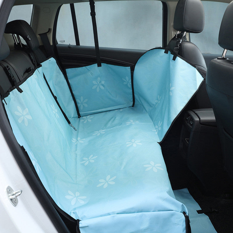Blue FurBuddy waterproof dog car seat cover installed in a car
