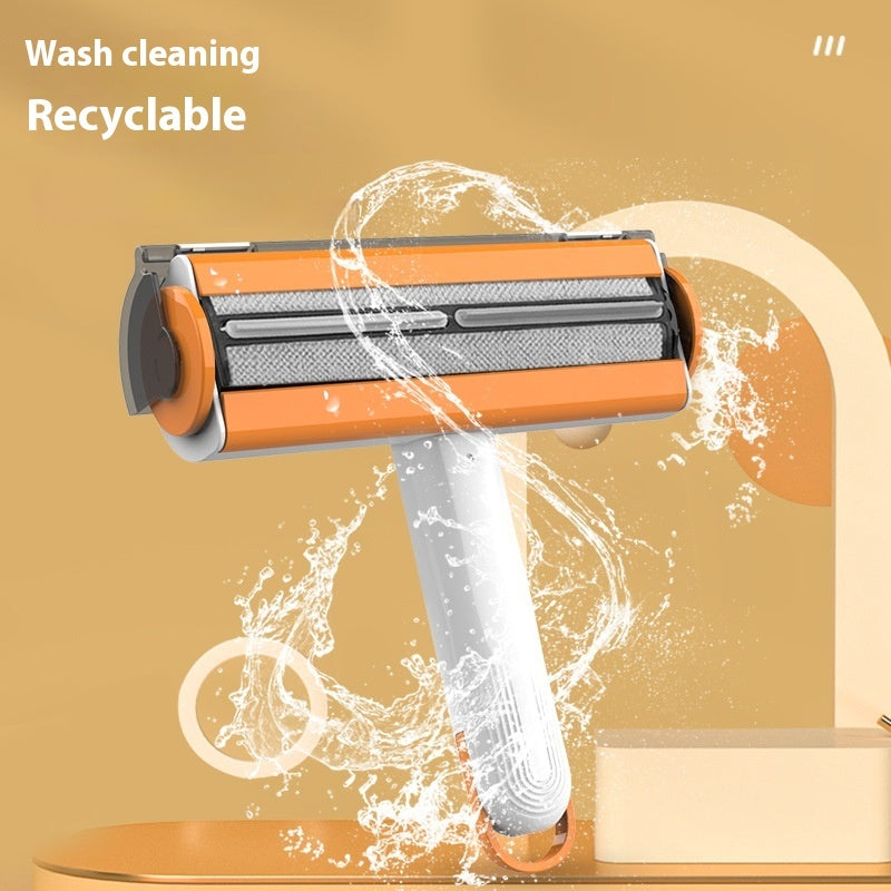 White and orange reusable pet hair removal roller